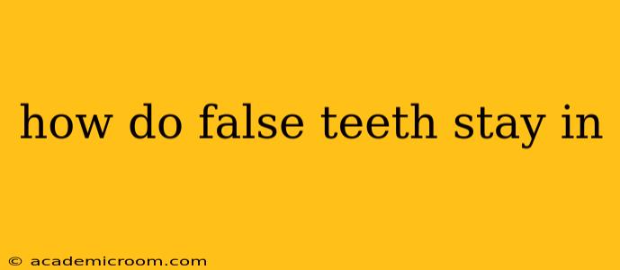 how do false teeth stay in