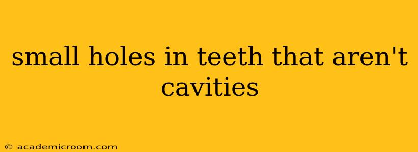 small holes in teeth that aren't cavities
